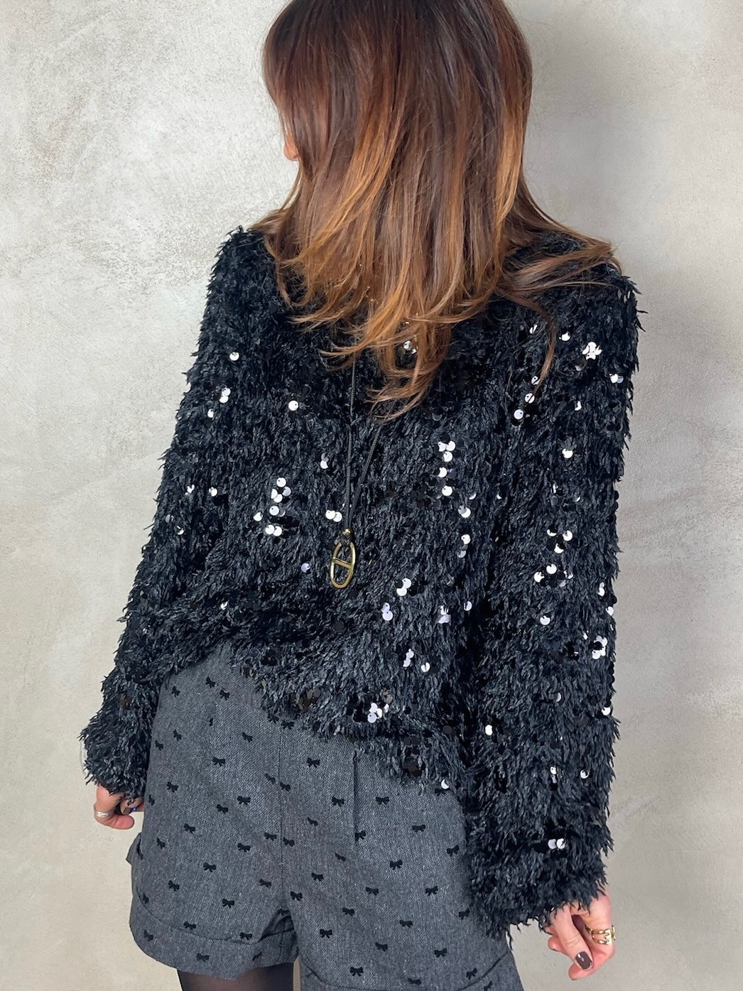 Top plumes sequins noir