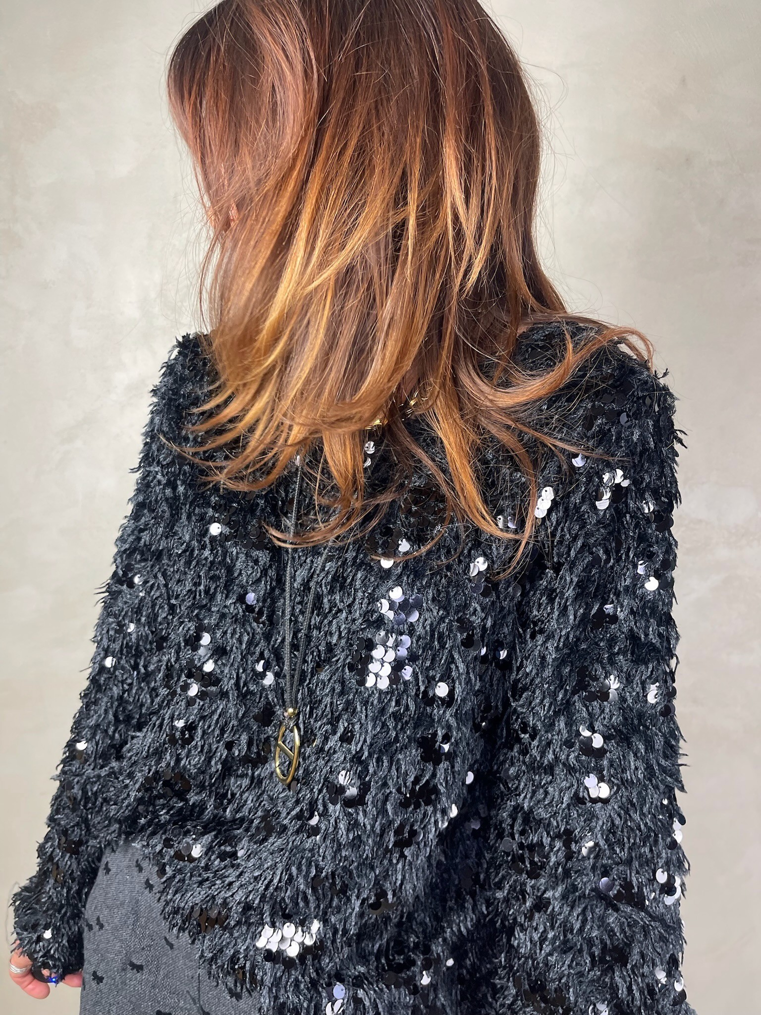 Top plumes sequins noir