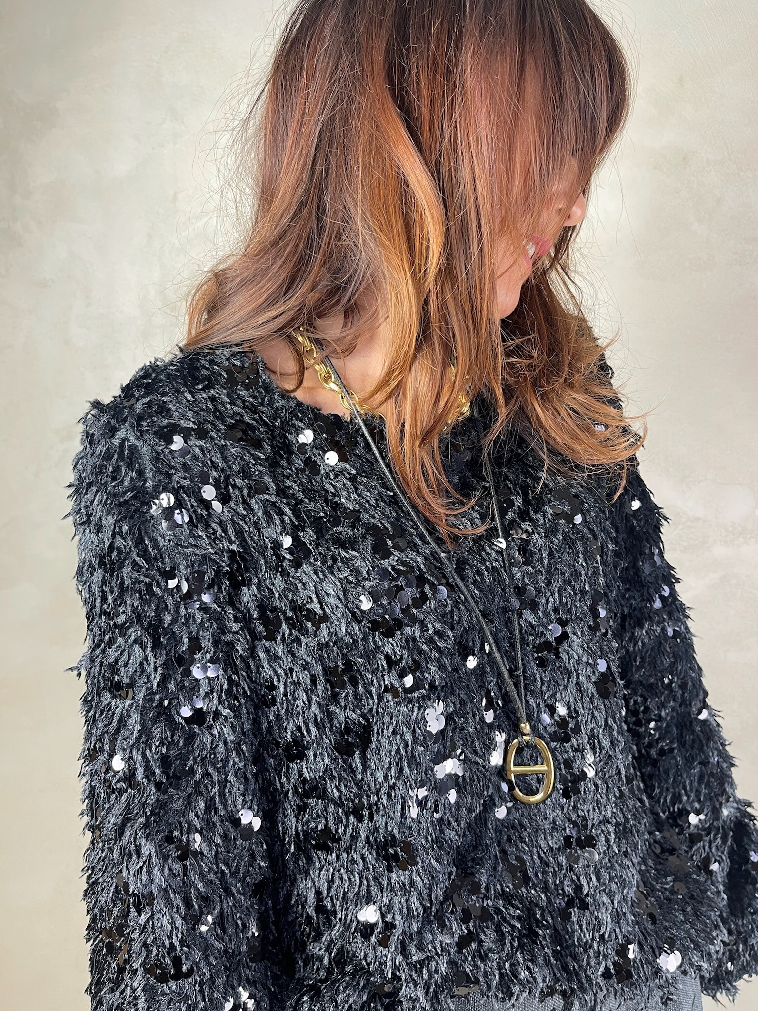 Top plumes sequins noir