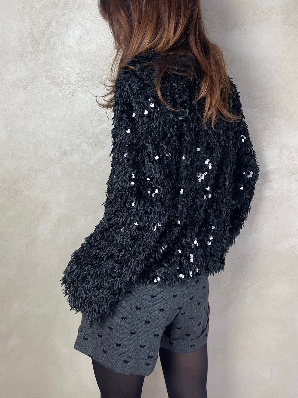 Top plumes sequins noir